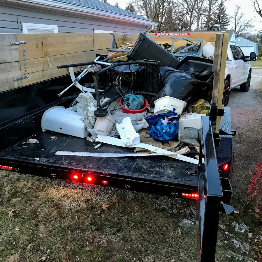 Roll-off dumpster delivered to a residential driveway in Gilmanton