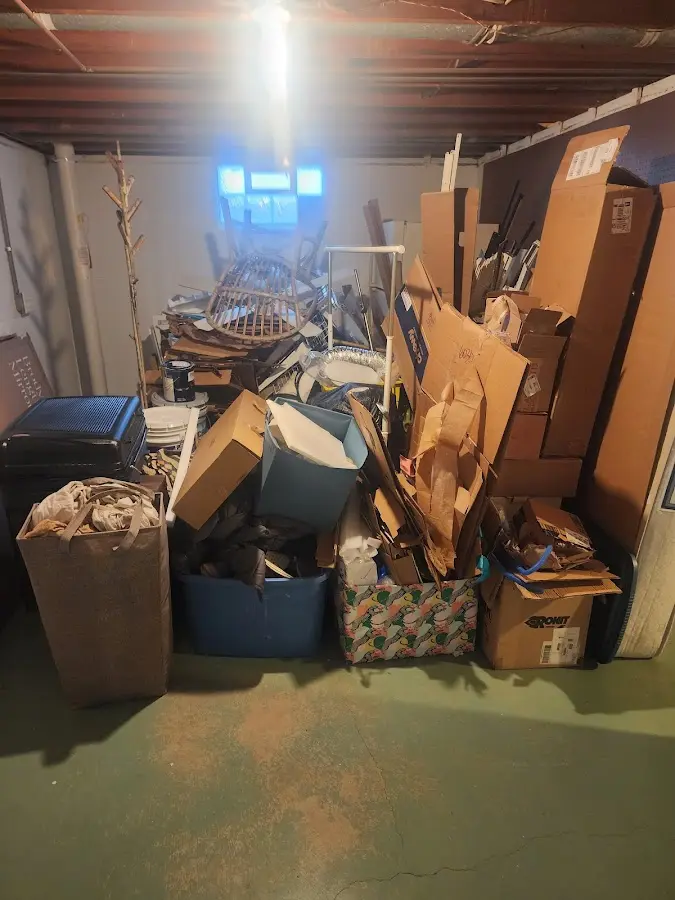 Roll-off dumpster container at job site for 2 Yard Dumpster Rental in Gilmanton